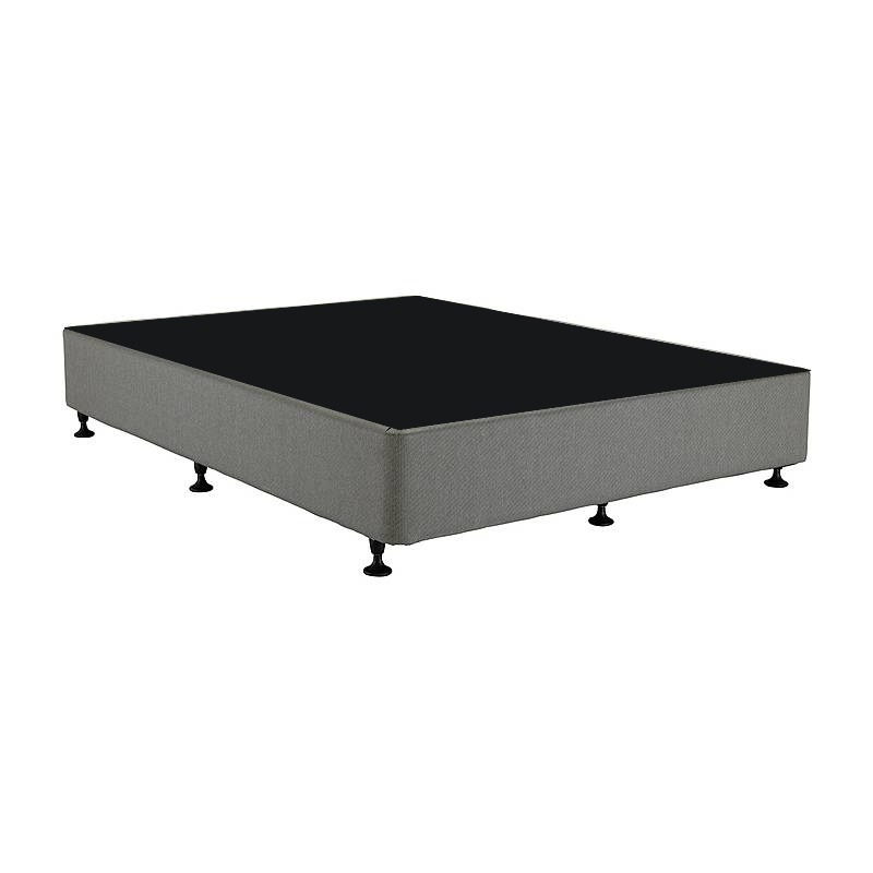 Grey upholstered standard bed base with black dust-cover top and black feet
